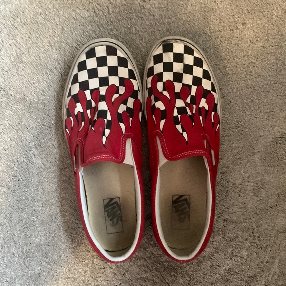 BLACK AND RED CHECKERED SLIP ON VANS WITH FLAME DESIGN